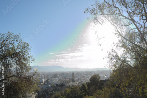 Malaga cathedral and city at sunset from Gibralfaro, Spain photo