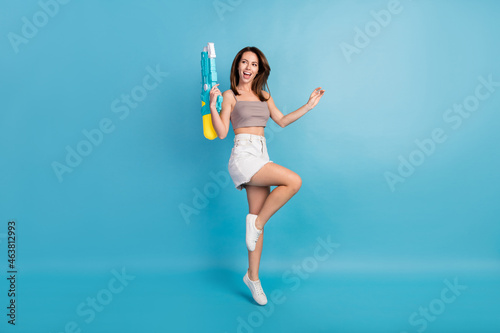 Photography Full size photo of young brunette woman jump up look empty space hold hands wate