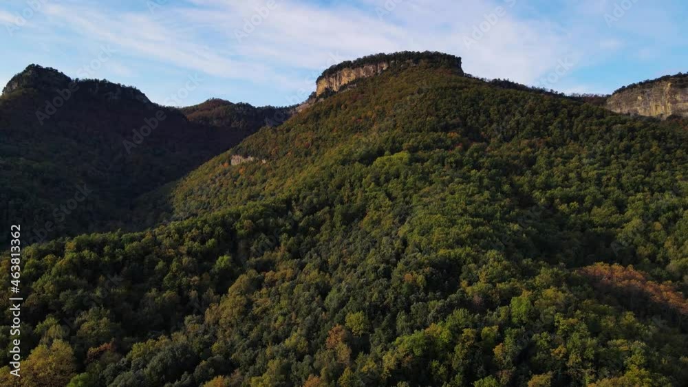 Aerial scene with drone of the autumn landscape in La Vall D En Bas, La Garrotxa, Girona, Spain. 4K UHD