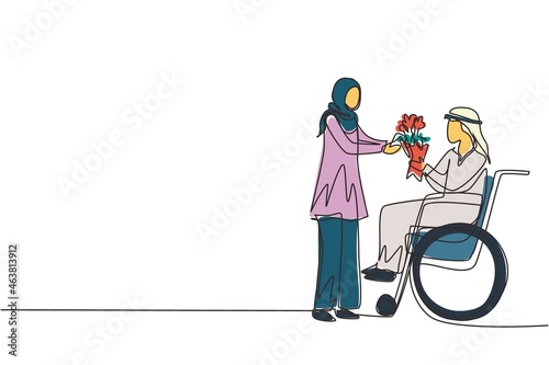 Single continuous line drawing Arabian woman and disabled man in wheelchair. Male give bouquet of flower to female. Family support. Disability rehabilitation. One line draw design vector illustration