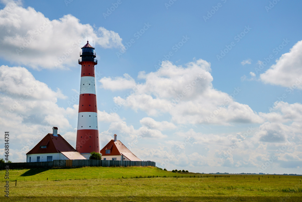 Lighthouse Westerhever in Schleswig Holstein, Germany. View on landscape by national park Wattermeer in Nordfriesland. Lighthouse Westerhever in Schleswig Holstein, Germany. View on landscape by national park Wattermeer in Nordfriesland.