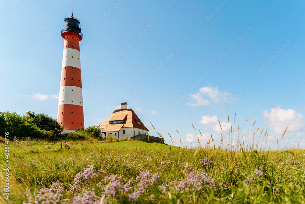 Lighthouse Westerhever in Schleswig Holstein, Germany. View on landscape by national park Wattermeer in Nordfriesland.
