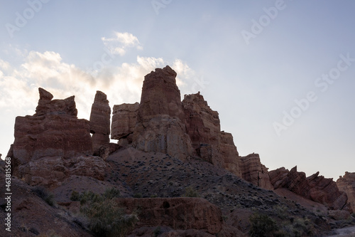 The geological formation of Charyn canyon consists of sedimentary red sandstone that has been subject of water and wind erosion resulting in  rare and colourful formations  in the form of sculptures.