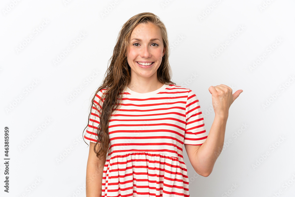 Young caucasian woman isolated on white background pointing to the side to present a product Young caucasian woman isolated on white background pointing to the side to present a product