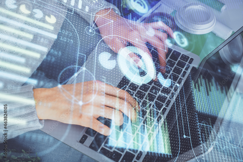Double exposure of woman hands working on computer and data theme hologram drawing. Tech concept. Double exposure of woman hands working on computer and data theme hologram drawing. Tech concept.
