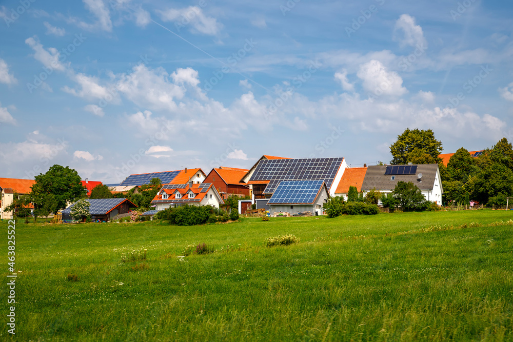 Solar panels on the roof of houses. Green energy Solar panels on the roof of houses. Green energy