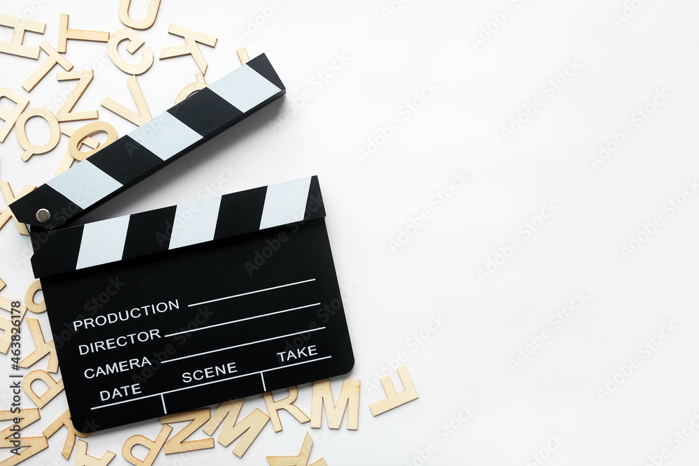 Film slate movie cut scence on wood text and clear background.For Film editing go viral by vdo marketing concept.