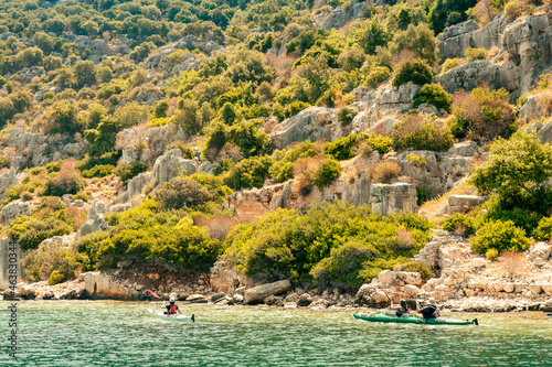 View of the northern side of the island of Kekova where the ruins of the partially flooded ancient cities of Dolichiste, Aperlaia, Teimussa and Simena are located. Turkey. Boat trip