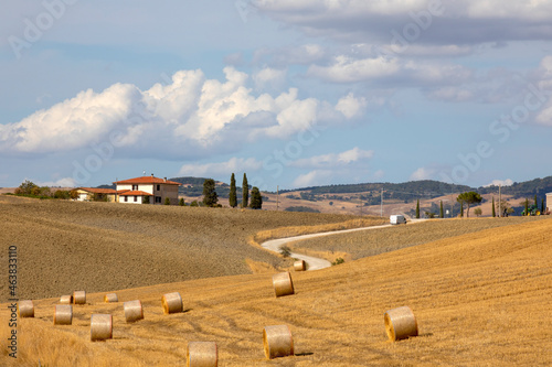 Val d' Orcia (SI), Italy - August 05, 2021: Typical landscape in val d' Orcia, Tuscany, Italy photo