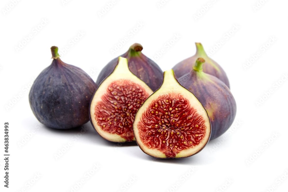 Fig fruit with ripe red halves isolated on white Fig fruit with ripe red halves isolated on white