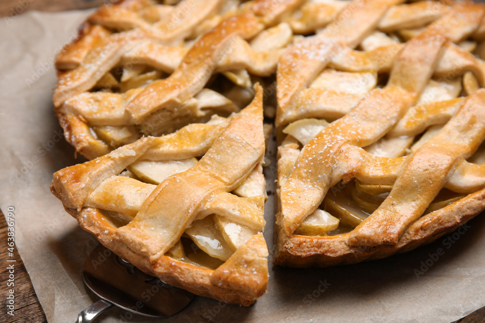 Delicious traditional apple pie on table, closeup Delicious traditional apple pie on table, closeup