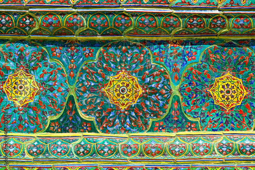 Colorful Amazing Vintage Glazed Tiles of Wat Ratchabophit Buddhist Temple Exterior, Bangkok, Thailand photo