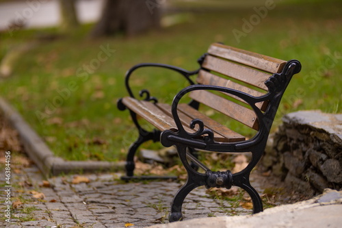 Bilde på lerret A bench in the park and on the promenade overlooking the sea in the city of Ista