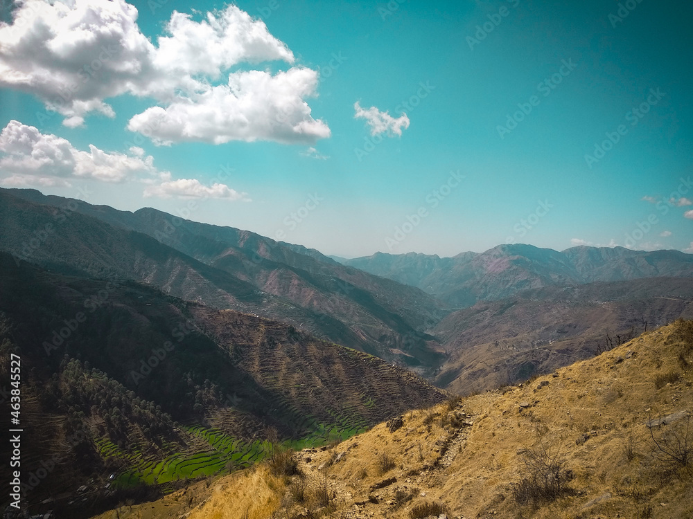 a never ending view of the valley where cloud seems like blown off 