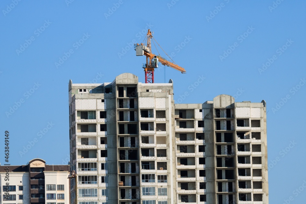 Fototapeta premium The architectural complex of residential buildings on sky background