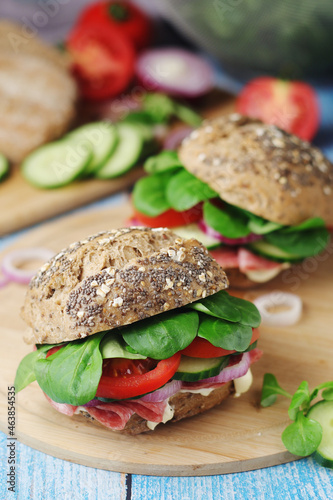 Homemade sandwiches with ham and vegetables