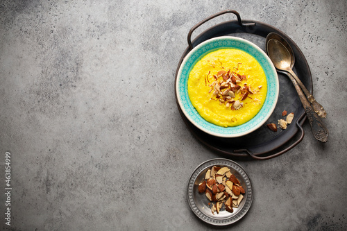 Traditional Indian kheer (Sweet rice milk pudding with almonds and saffron) photo