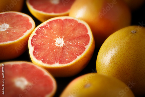 Grapefruit, whole and halved photo