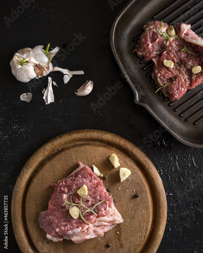 seasoning the steak for the dinner photo