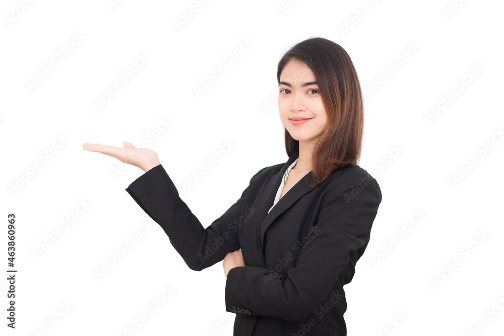 Thai Asian woman wearing a black suit, she is looking at the camera and opens her hand to the left. Thai Asian woman wearing a black suit, she is looking at the camera and opens her hand to the left.