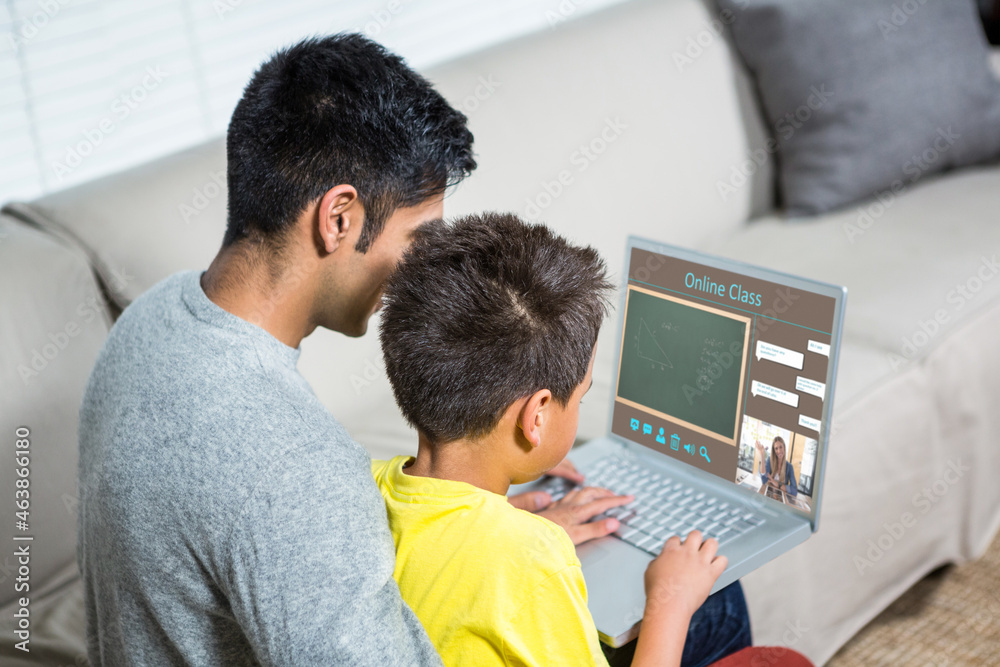 Biracial boy with father using laptop for video call, with smiling caucasian teacher on screen Biracial boy with father using laptop for video call, with smiling caucasian teacher on screen