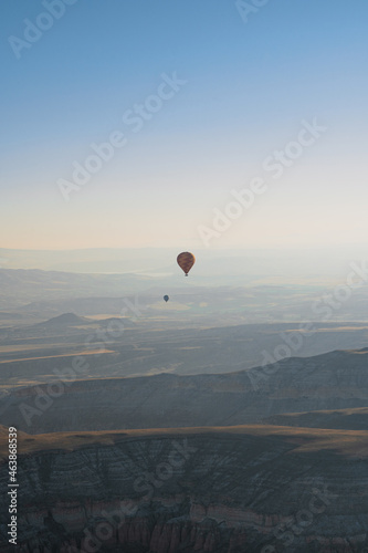 hot air balloons rising over the Cappadocia valley