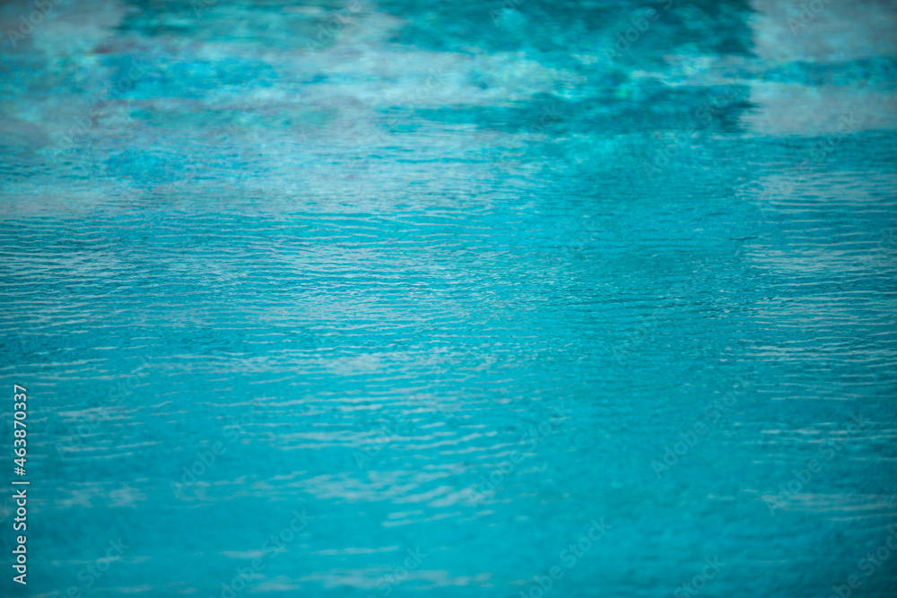 Water in swimming pool, background with high resolution. Wave abstract or rippled water texture. Water in swimming pool, background with high resolution. Wave abstract or rippled water texture.