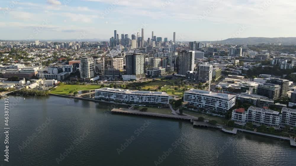 Waterfront Buildings At The Side Of Brisbane River In Newstead Suburb, QLD, Australia. aerial Waterfront Buildings At The Side Of Brisbane River In Newstead Suburb, QLD, Australia. aerial