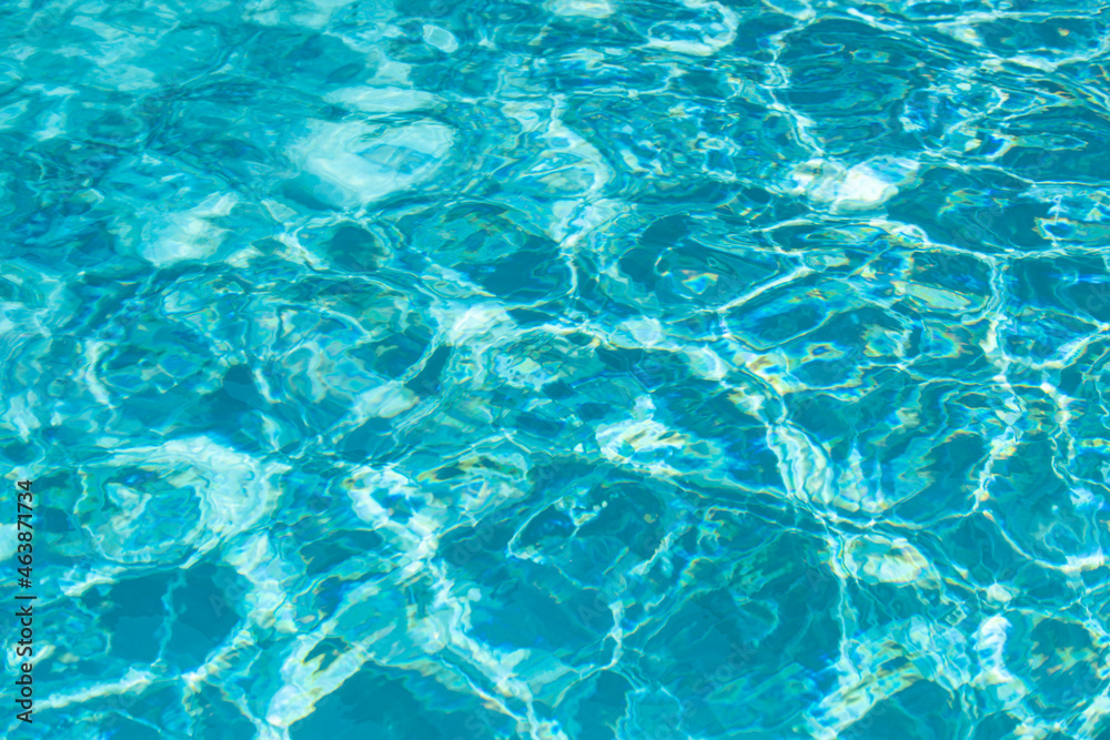 Naklejka premium Tansparent clear calm water surface texture. Abstract nature background. Sea water pattern.