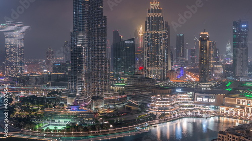 Aerial view of Dubai city night timelapse in downtown. © neiezhmakov