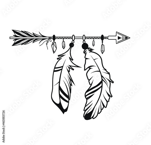Ethnic design. Indian arrow with feathers beads and threads. Tribal vintage dreamcatcher. Boho style arrow.