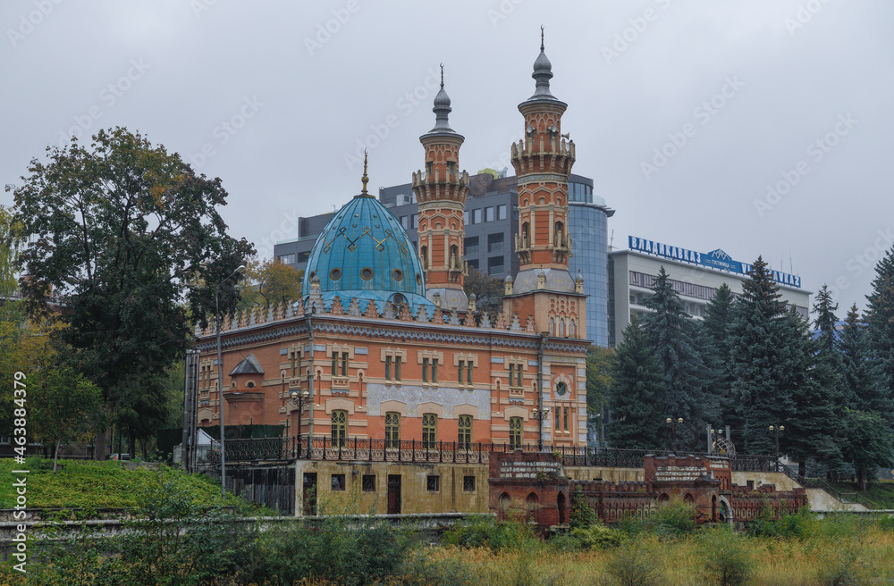 VLADIKAVKAZ, RUSSIA - OCTOBER 01, 2021: View of the old Sunni mosque (Mukhtarov Mosque) on a cloudy October day