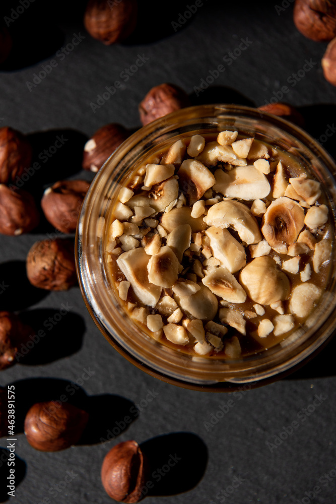 Hand made vegan caramel with nuts. Soft focus. Close-up. Copy space.Top view. Organic food.