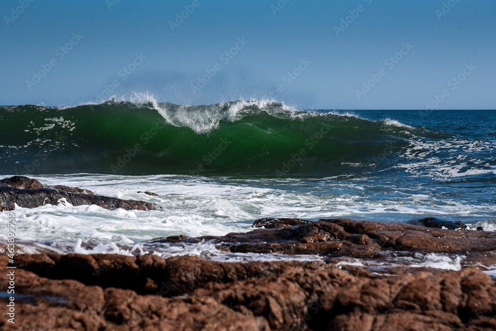 waves crashing on rocks