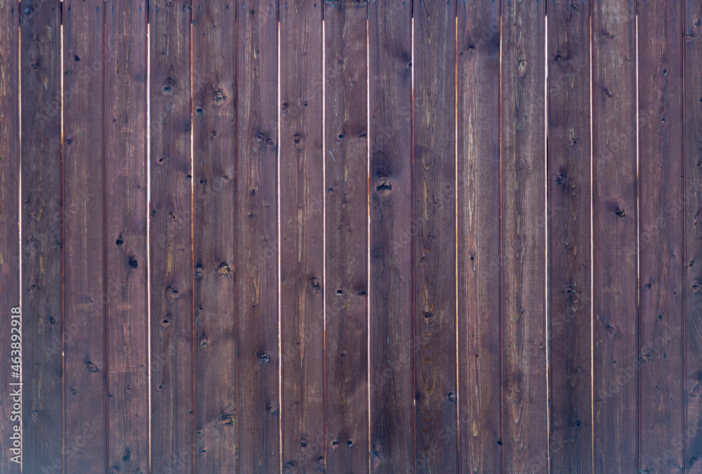 Old wooden fence. Darkened wood. Texture. Copy space