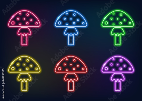 Neon frame. Set of neon mushrooms in different colors. Laser glowing lines on a black background. 