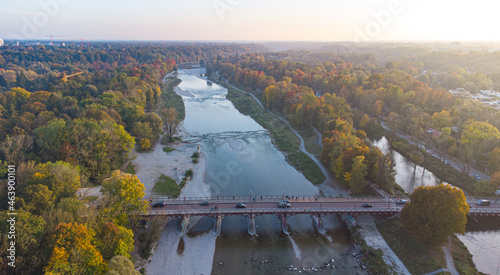 Aerial views of autumn in Munich. Isar river seen from above with colorful trees nearby photo