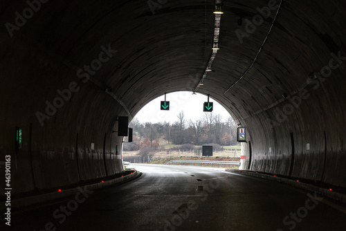 Red and green lights in tunnel.