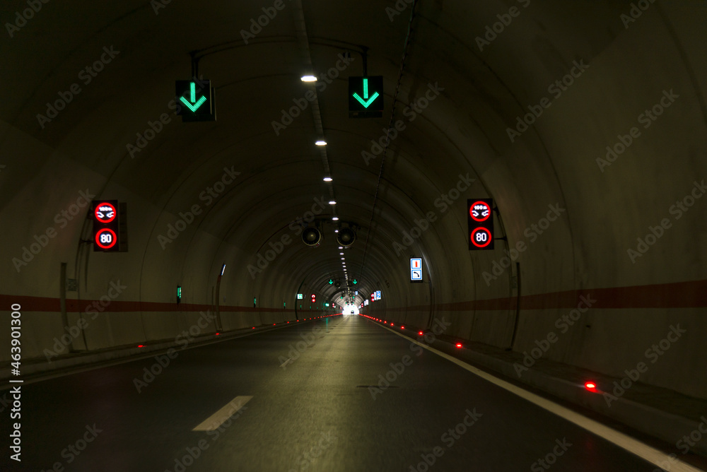 Red and green lights in tunnel.