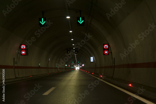 Red and green lights in tunnel.