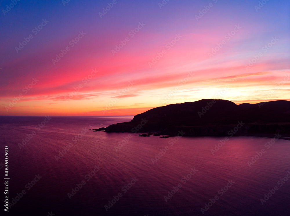 Vibrant sunrise over the sea cliffs