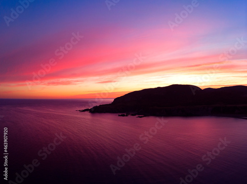 Vibrant sunrise over the sea cliffs