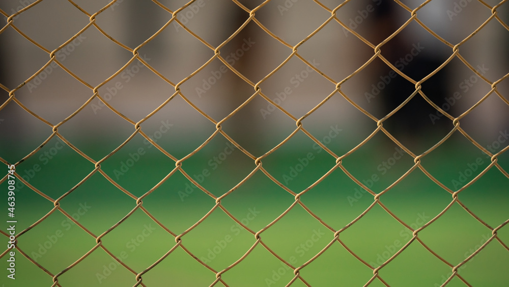 Close up of old chain fence at a football ground. Close up of old chain fence at a football ground.