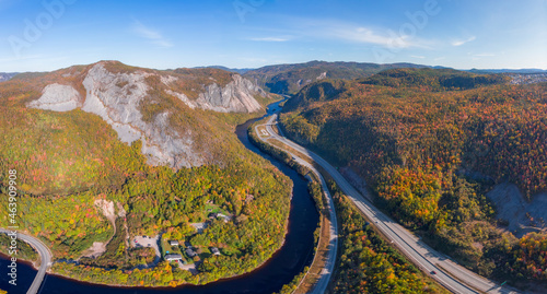 Highway running through the autumn valley