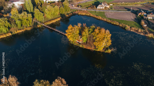 Fishermans House in autumn, vertical aerial view, Staryi Solotvyn, Ukraine