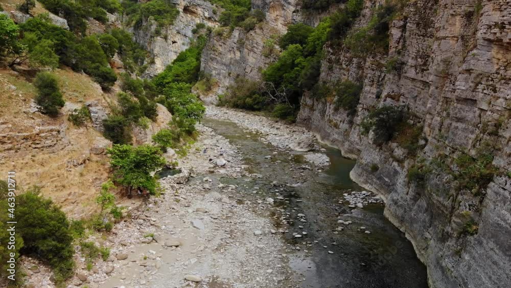 Flying on a drone over a river through a canyon in Albania. Permet hot springs. 4K UHD video. Flying on a drone over a river through a canyon in Albania. Permet hot springs. 4K UHD video.