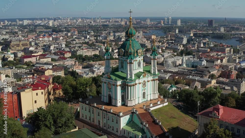 Beautiful flight over St. Andrew's Church in Kiev. Top view of Podol. Many buildings and churches. Beautiful flight over St. Andrew's Church in Kiev. Top view of Podol. Many buildings and churches.