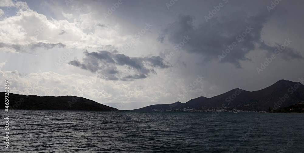 panoramic view of the village of Plaka on the island of Crete before the rain on a cloudy day, horizontal.