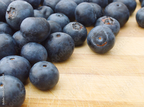 blue berry on wooden board