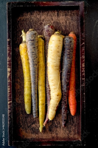 Colourful carrots in a wood basket